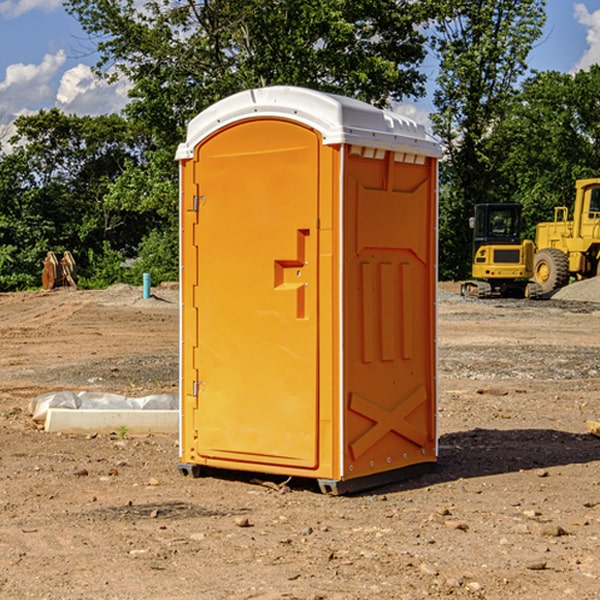 what is the cost difference between standard and deluxe portable restroom rentals in Farmland IN